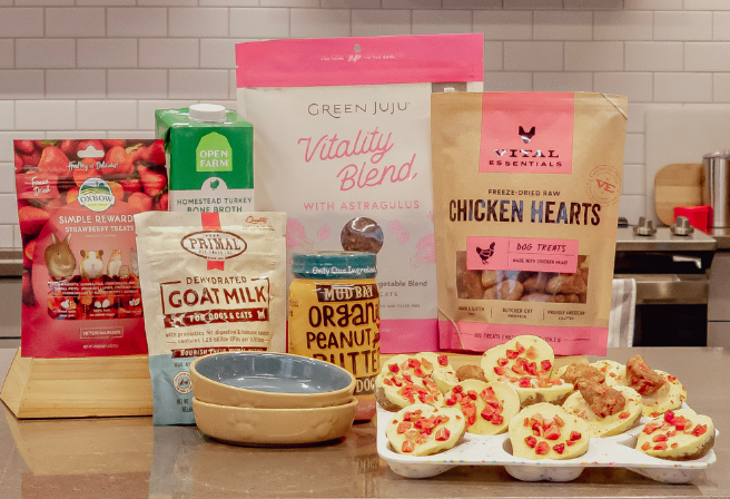 kitchen counter with dog treats and ingredients